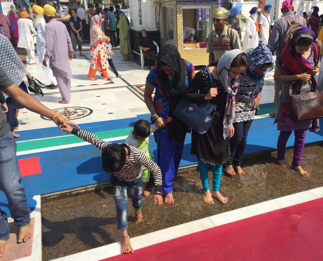 Washing the feet before entering.