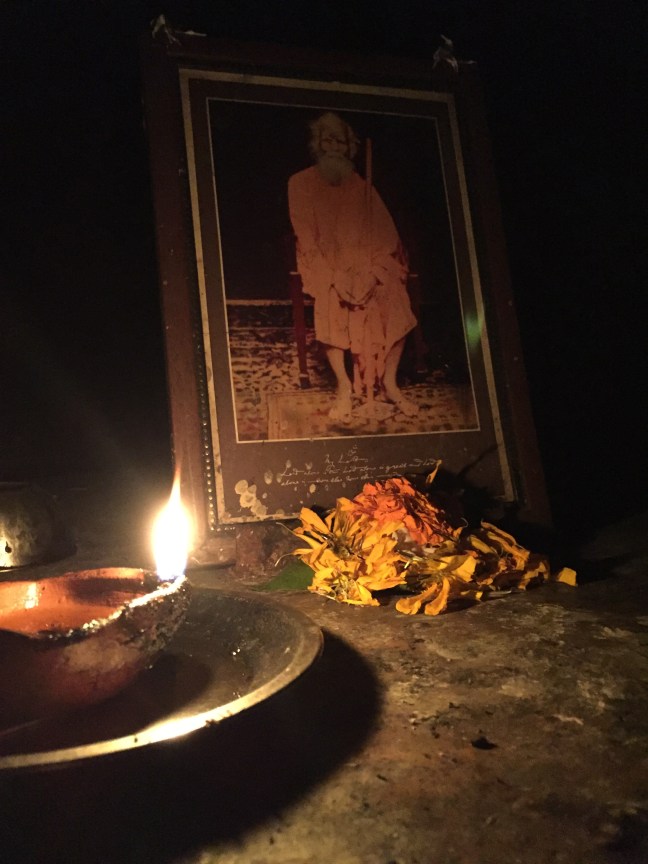A small alter near the cave entrance. I do not know who the picture is of, but I suspect it is the swami that started the ashram here.