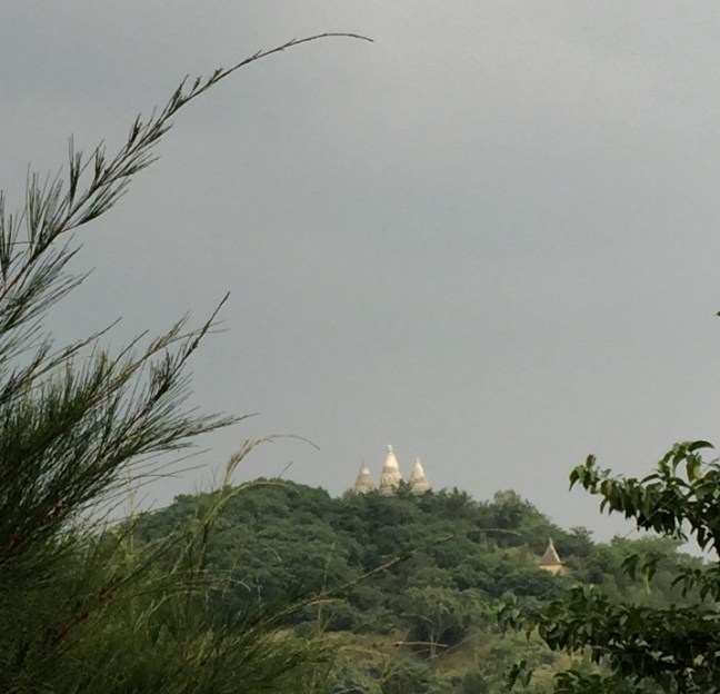 Magical, distant temple, keeping watch over me.