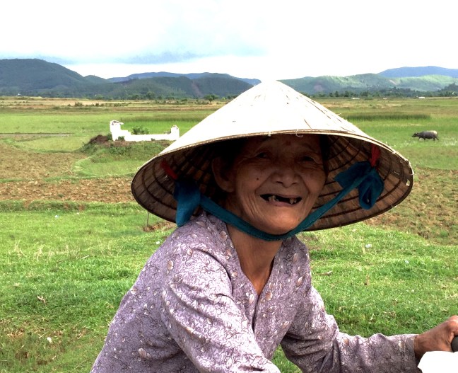 This woman. Her eyes may be shaded but her smile radiates for miles.