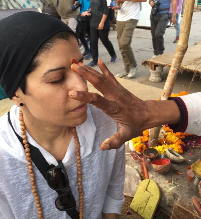 Annabell receiving a blessing