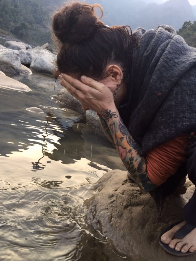Drinking in the purifying waters of the Great Mother Ganges